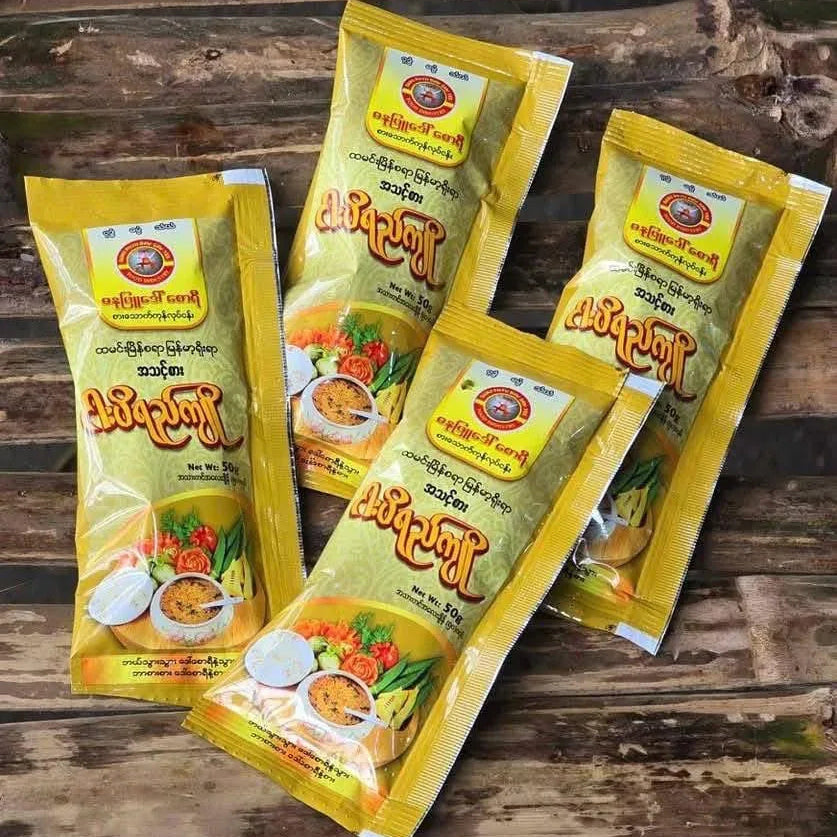 ဓနုဖြူ ဒေါ်စောရီ ငပိရည်ကျို - Easy Bites