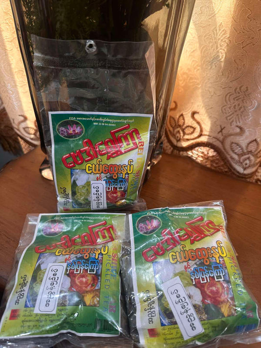ဗေဒါရွှေကြာ အညွှန့် ချဥ်စပ် 160g (Bei Da Shwe Kyar A Nyut Spicy Pickled Tea Leaf )
